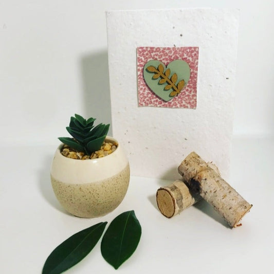 Seeded all occasions card. Embellished with a pale green heart, topped with a gold leaf design.