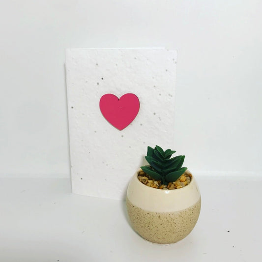 Seeded, plantable greeting card. With hand painted pink heart motif .