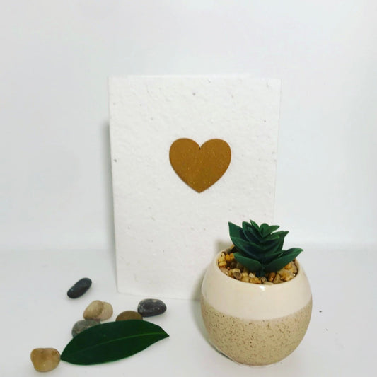 Seeded, plantable greeting card. Embellished with hand painted gold heart motif .